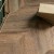 Кварцвиниловый SPC ламинат Vinilam Parquet Chevron Шеврон Нормандия RI153610CL4 французская елка 1293×305×8,5 фото в интерьере