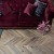 Кварцвиниловый SPC ламинат Vinilam Parquet Chevron Шеврон Лувр I107516 французская елка 1293×305×8,5 фото в интерьере