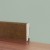 Плинтус деревянный Tarkett Дуб Шоколад 60х16 фото в интерьере